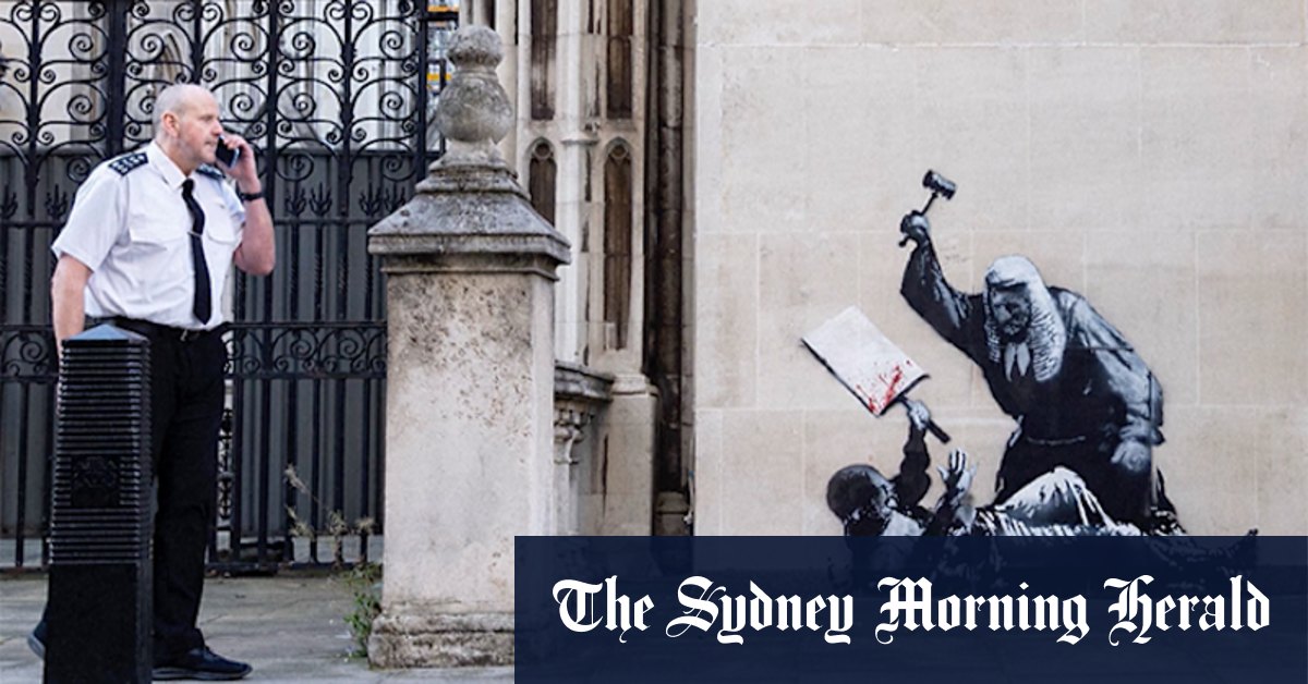 banksy-unveils-new-mural-of-judge-beating-protester-outside-london-court
